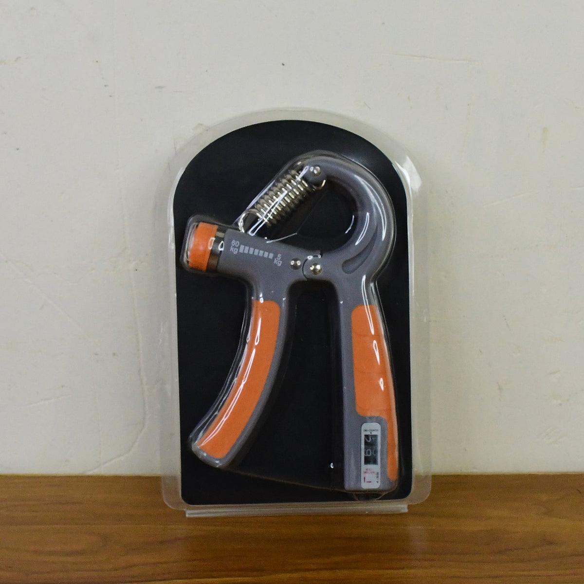 Durable hand grip strengthener with steel spring and ergonomic handles for fitness