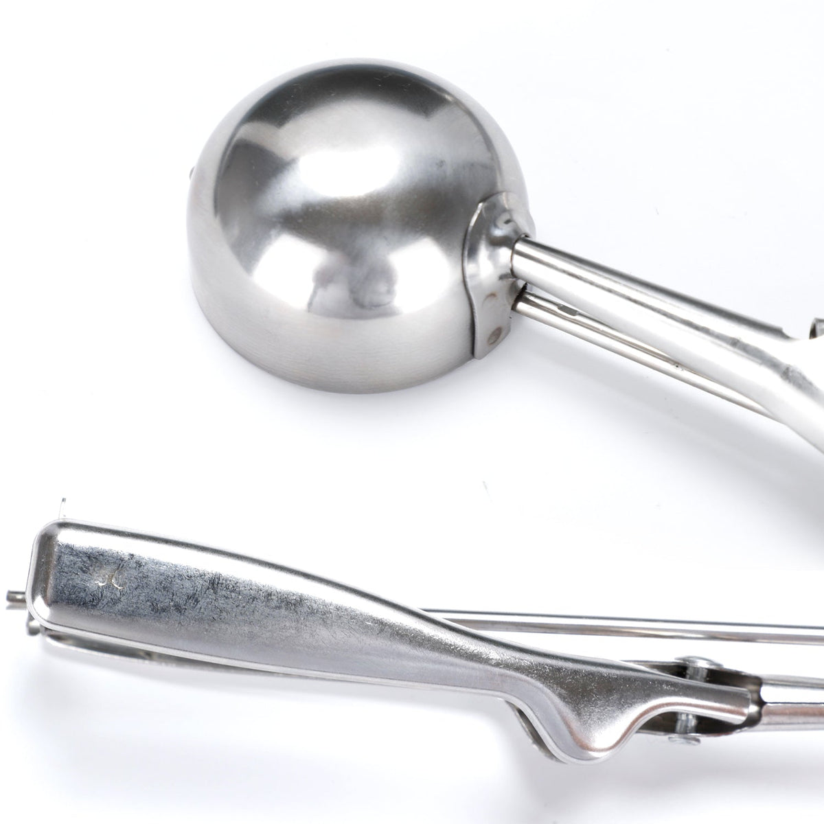 Ice cream scoop placed on a kitchen counter, ready to serve.