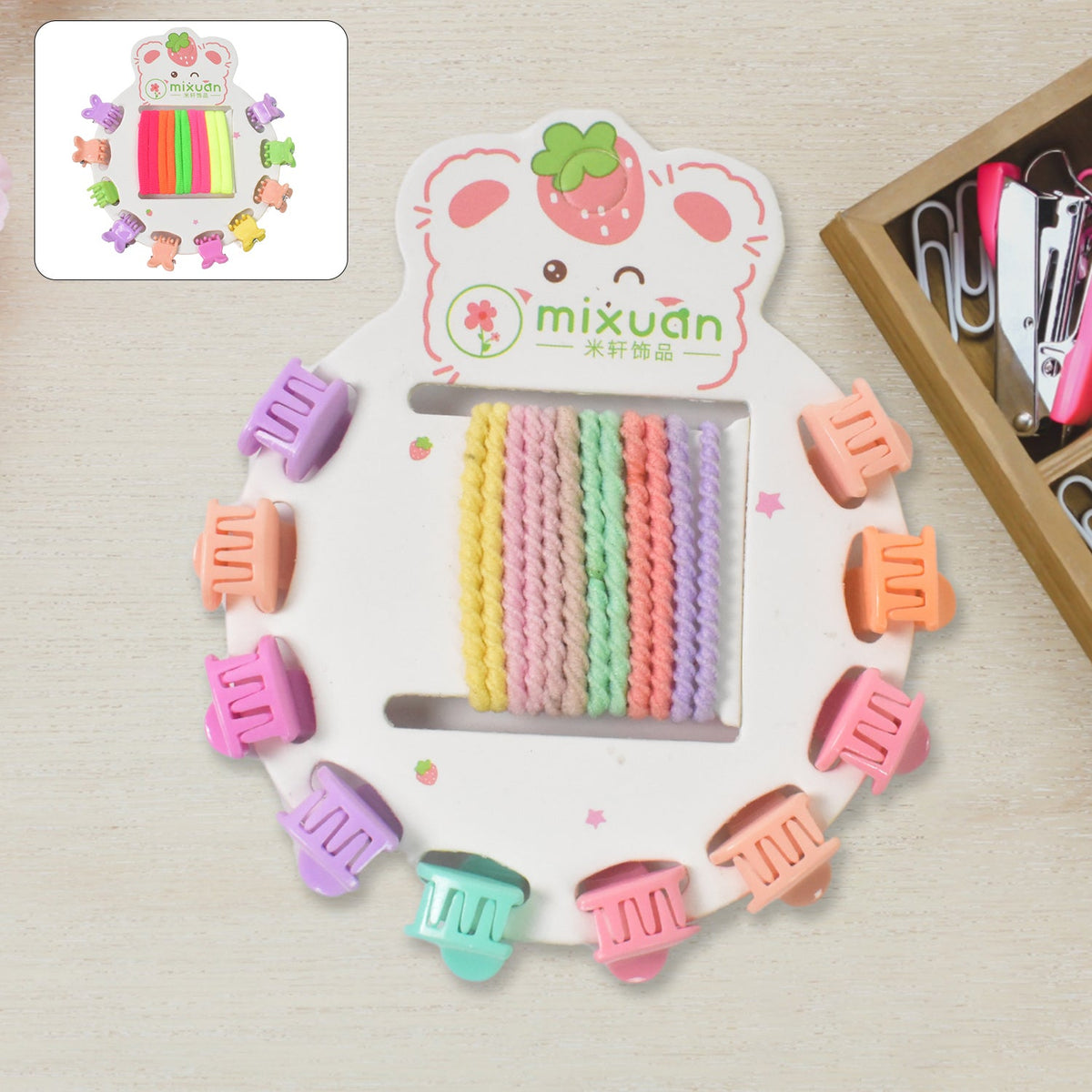 Colourful assortment of kids hair accessories, including clips and bands.