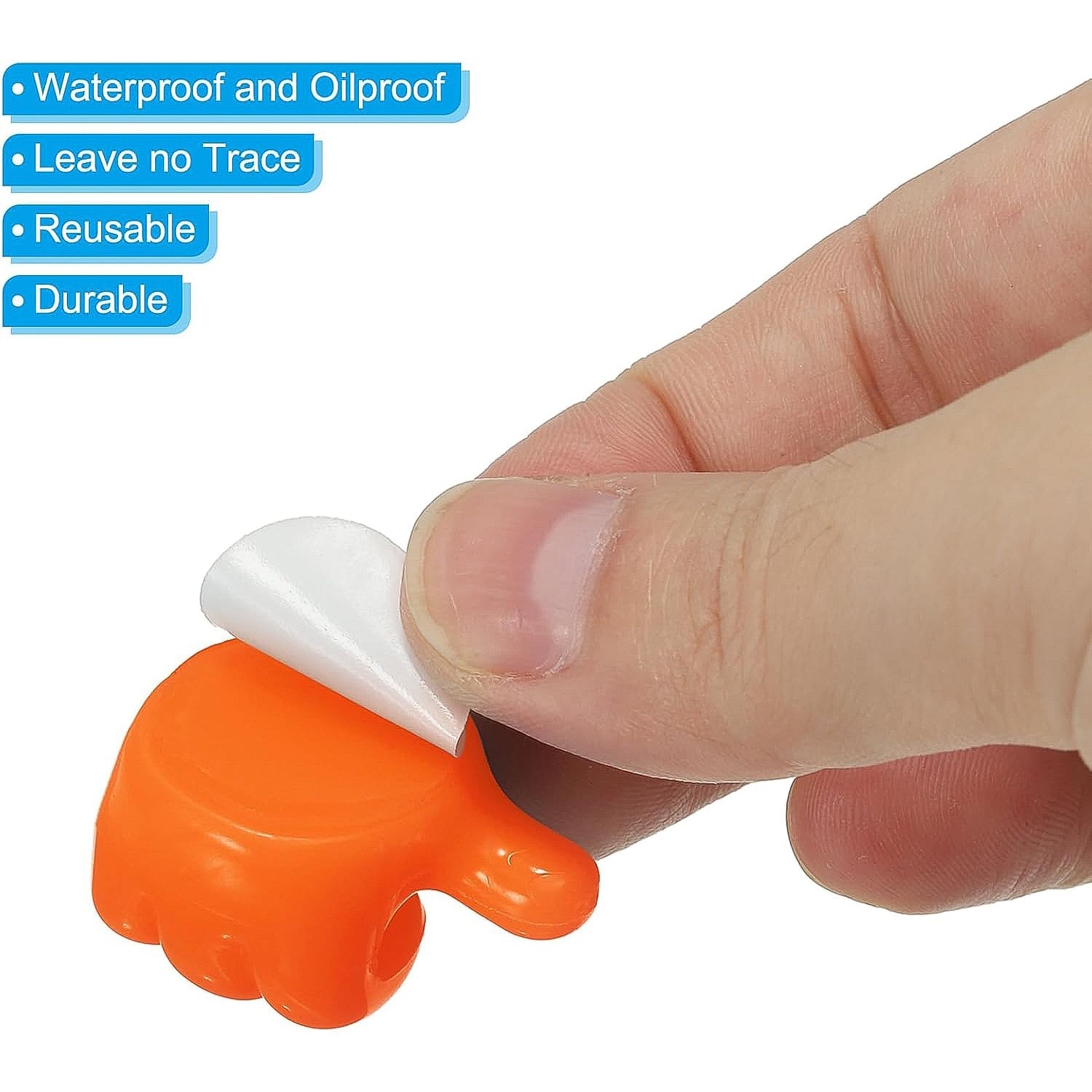 Empty orange hand-shaped silicone wall clip for organizing essentials
