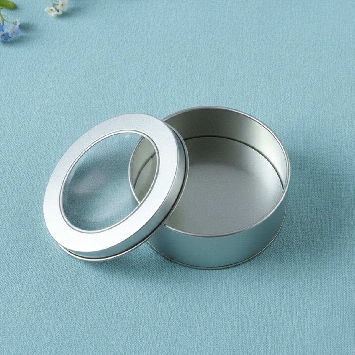 Elegant round tin box for storage and gifting