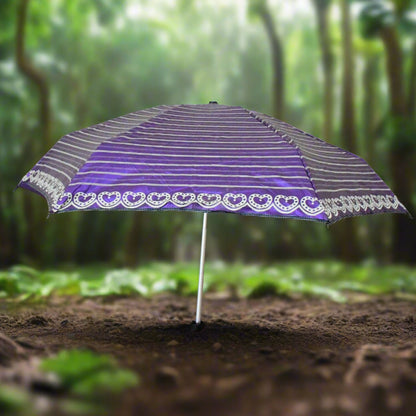 Demonstration of the umbrella's strong canopy offering reliable sun and rain protection.