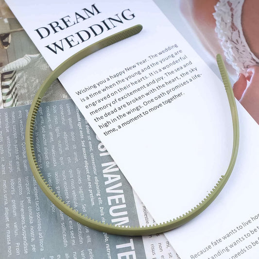 Flexible comb style plastic headband for secure hair grip