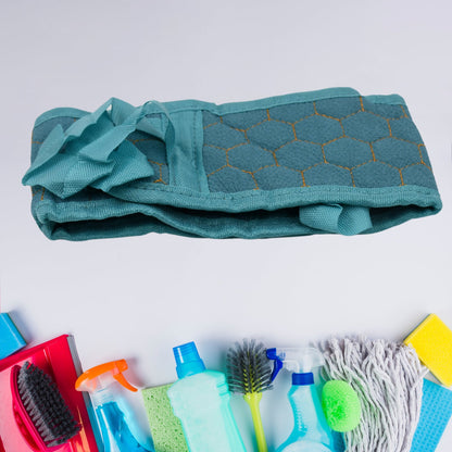 A person using the long handle back brush to scrub their back, demonstrating its reach.
