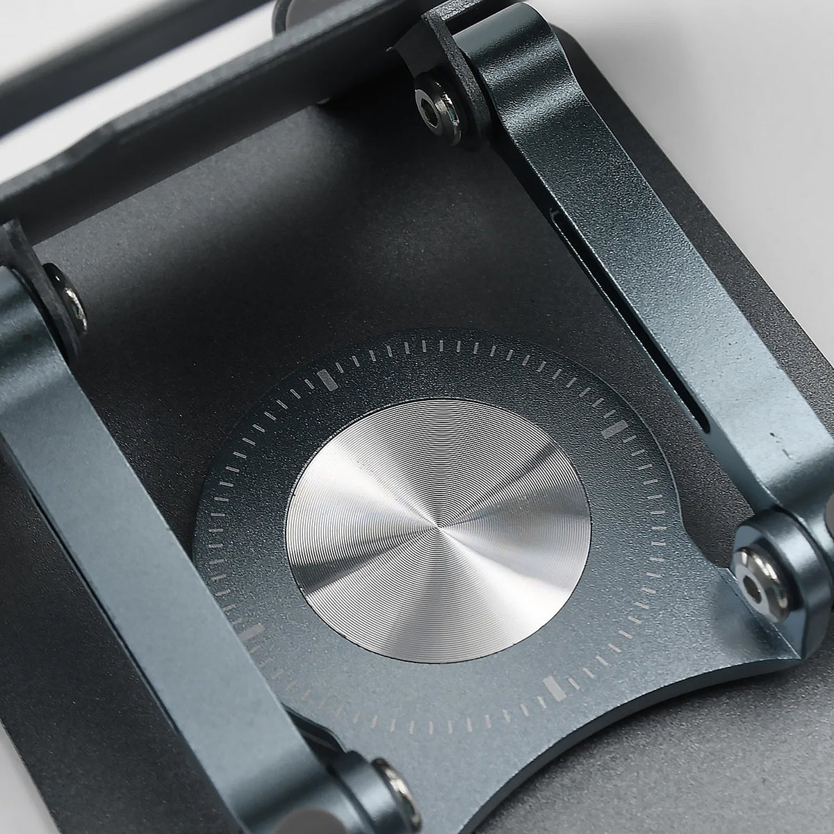 Side view highlighting the height adjustment feature of the ergonomic laptop stand.