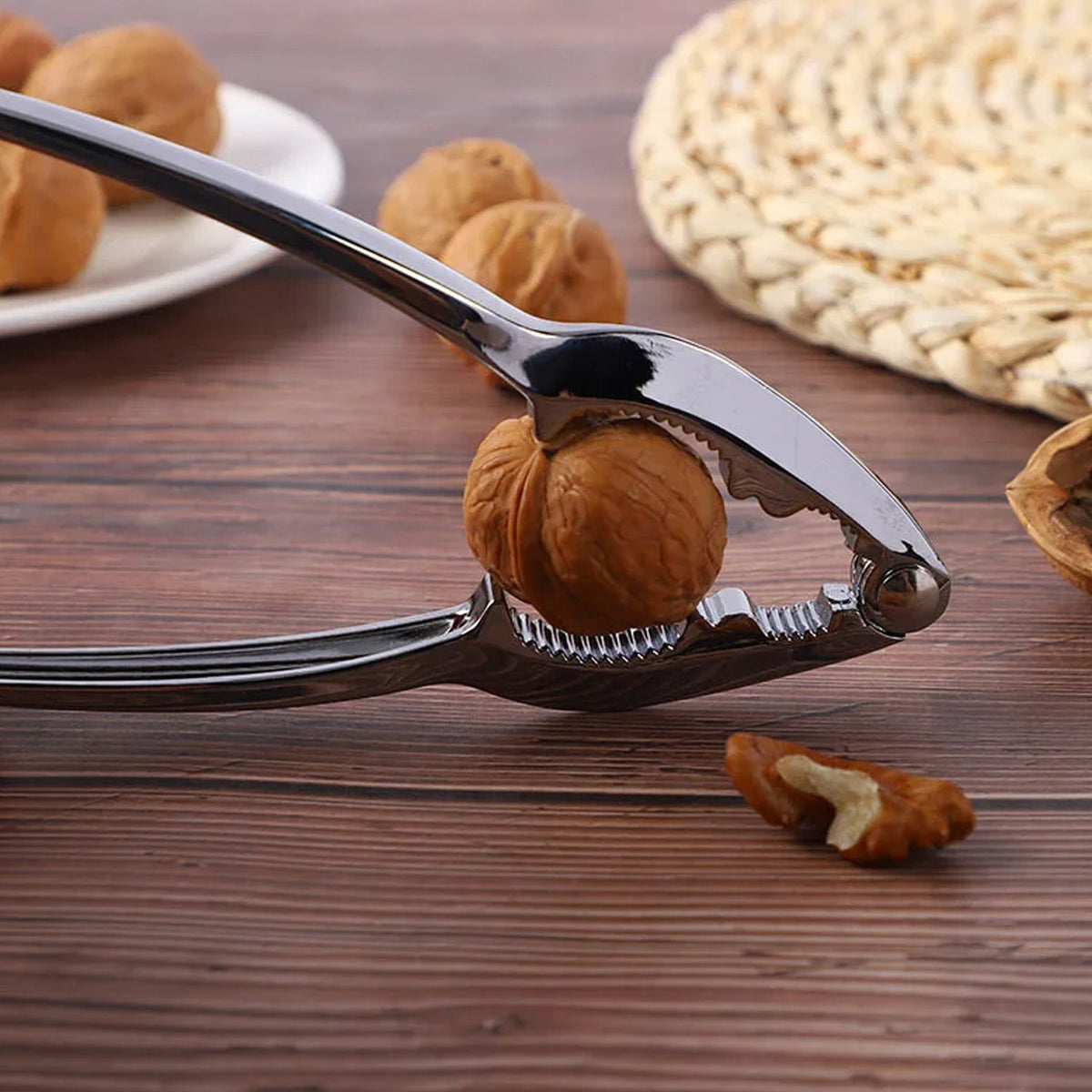 Top-down view of the durable stainless steel walnut cracker.