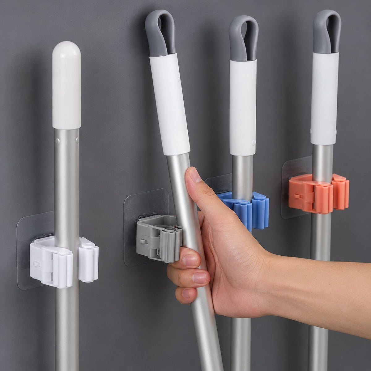 Laundry room with wall-mounted broom holder for cleaning supplies