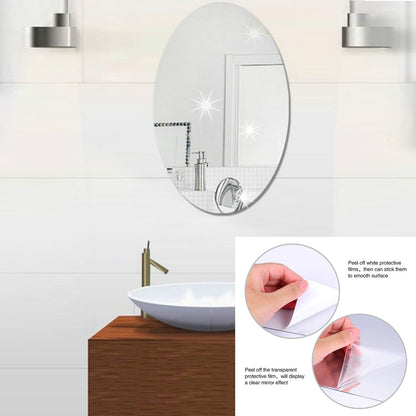 A set of two Styleva oval mirror stickers arranged decoratively on a wall.