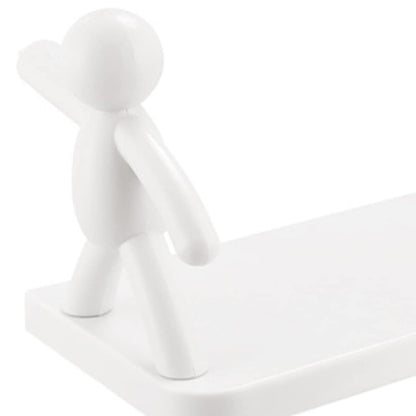 Decorative wall-mounted shelf featuring a human figurine for creative display.