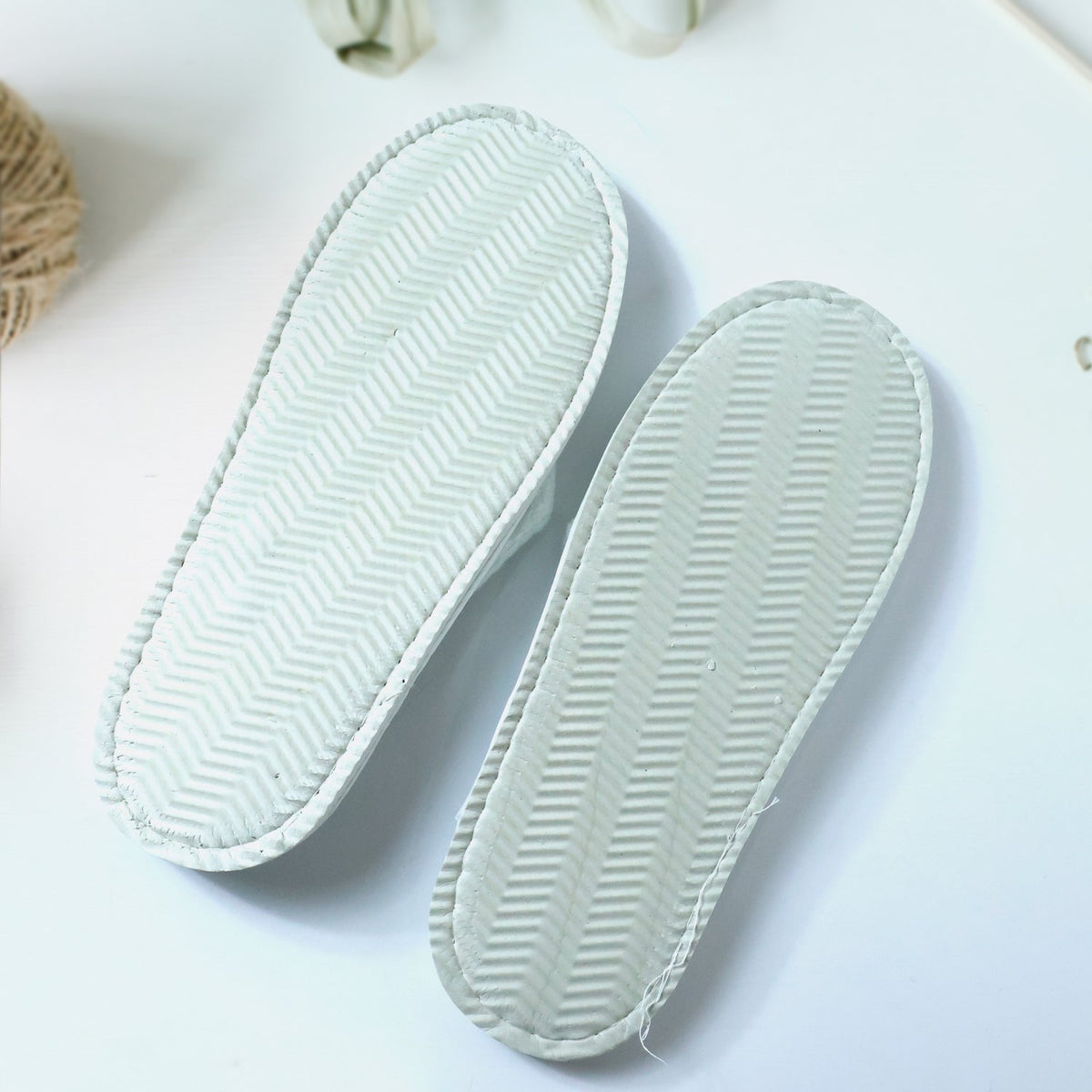 Bathroom slippers with slip-on design for hygienic use in hotels