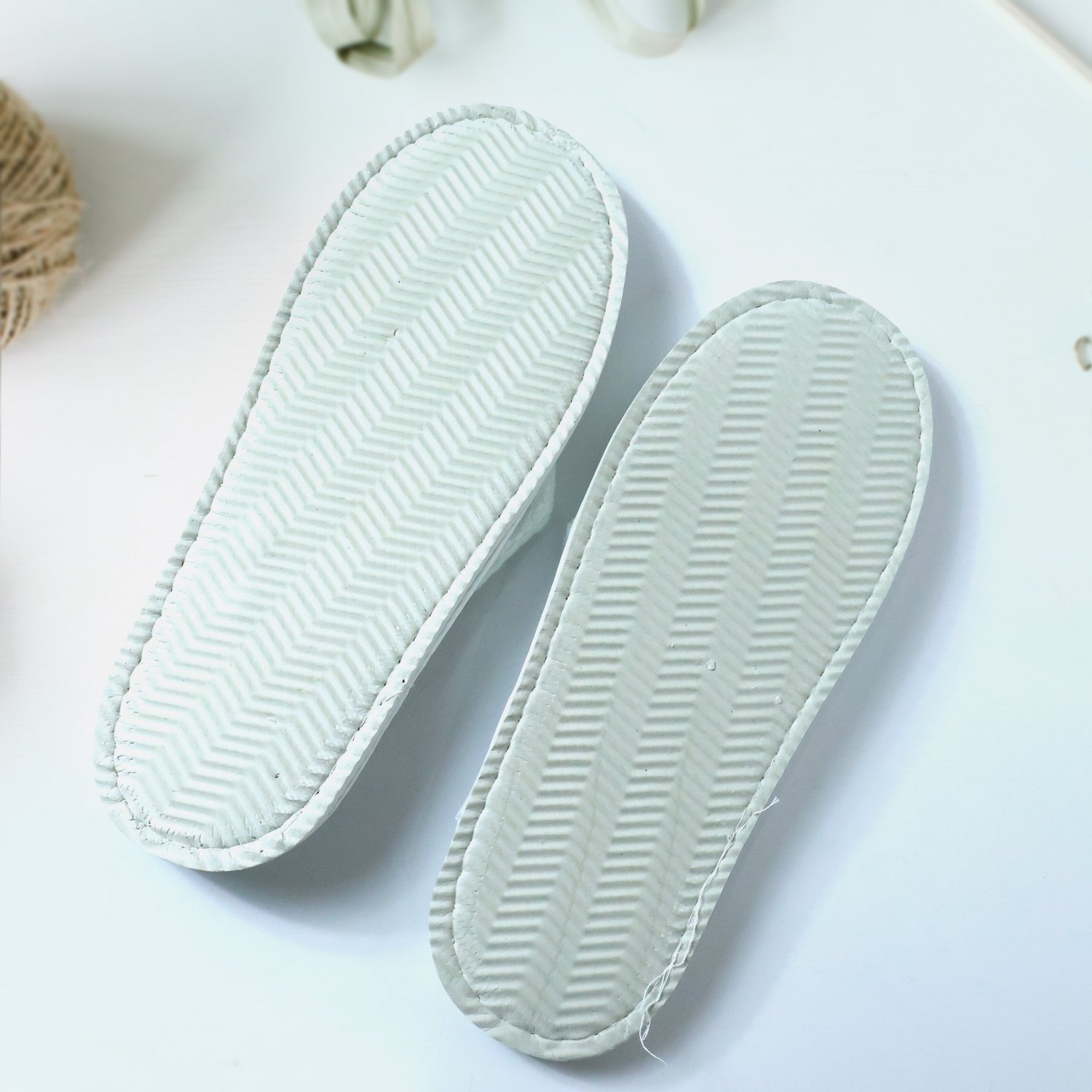 Bathroom slippers with slip-on design for hygienic use in hotels