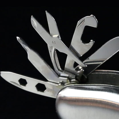 Multi Tool LED Flashlight displaying its integrated glass breaker and seat belt cutter.