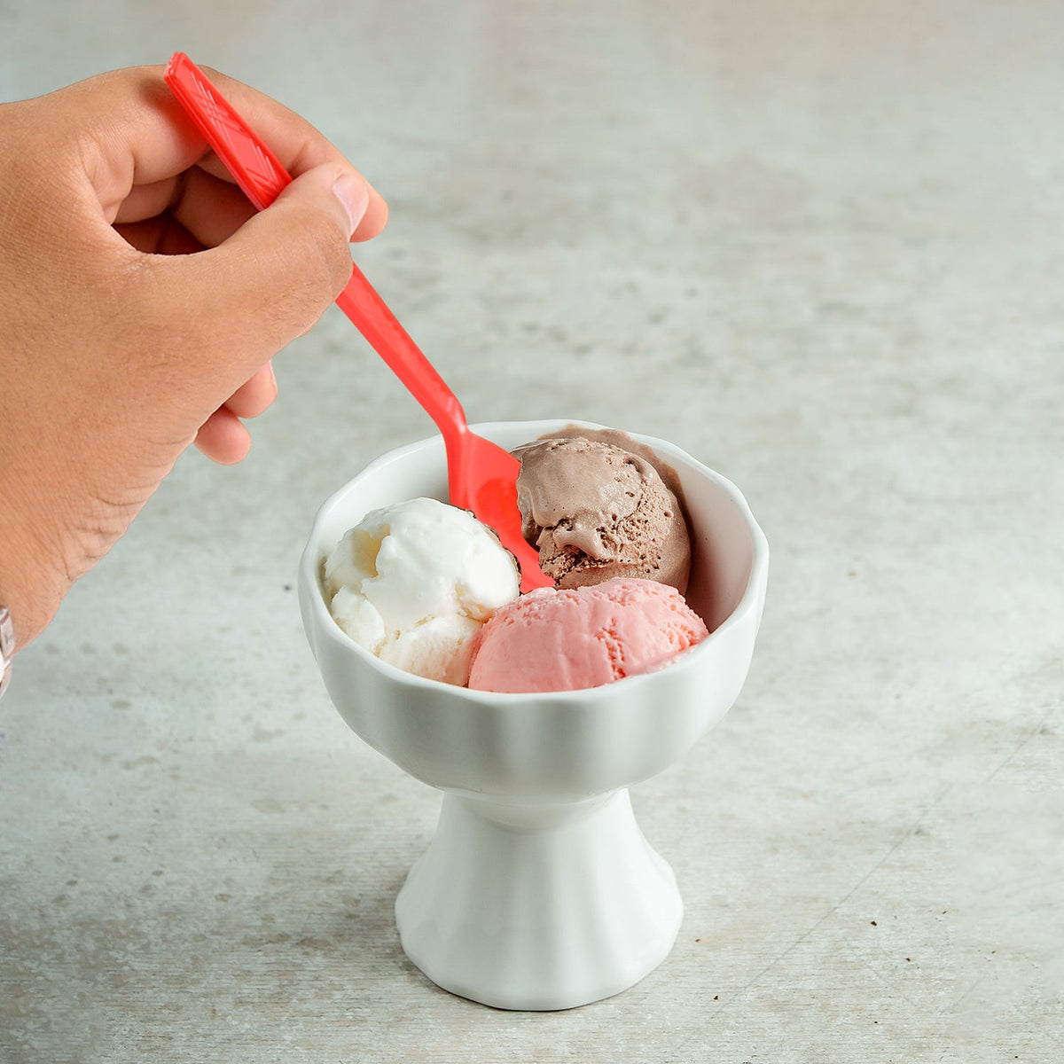 Durable and lightweight reusable plastic spoon safe for family use