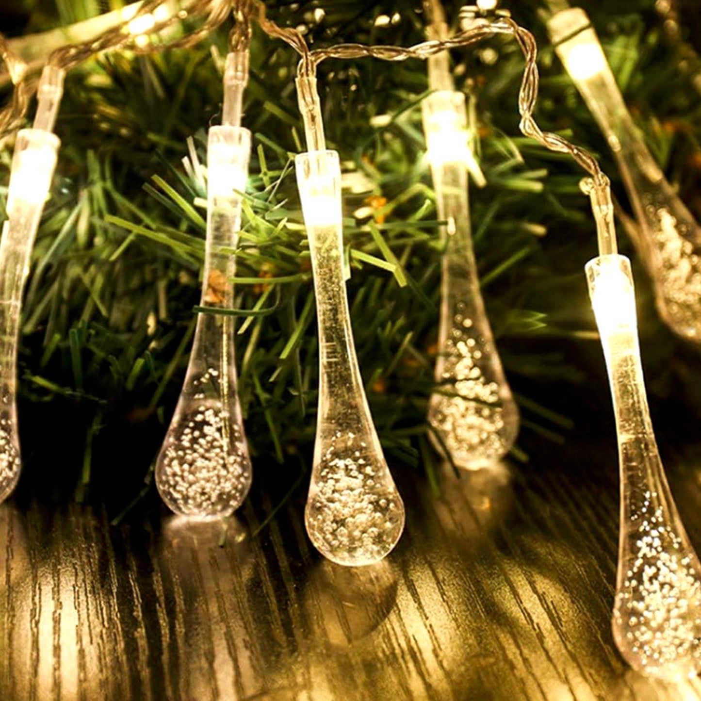 Close-up of a crystal water drop bulb on the LED string light.