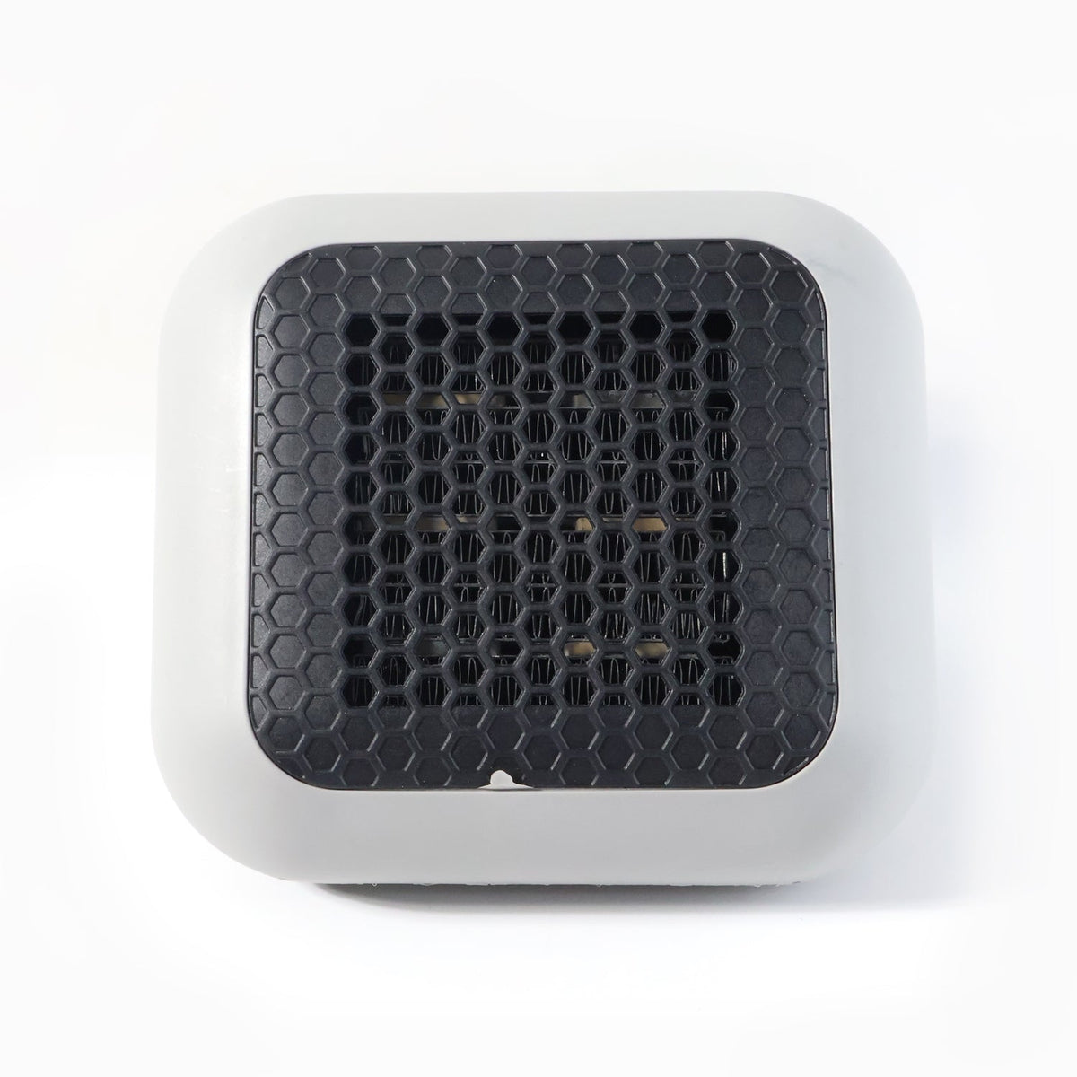 Small room warmed by the compact 600W plug-in wall-mounted room heater