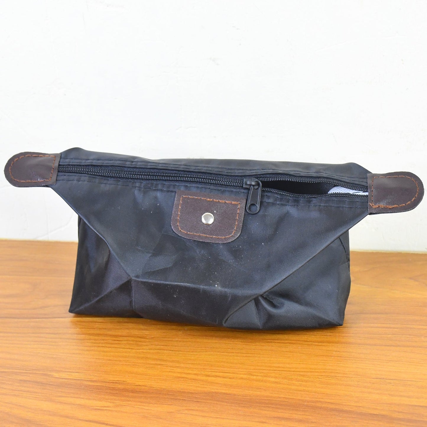 Foldable waterproof travel toiletry bag with secure zipper closure