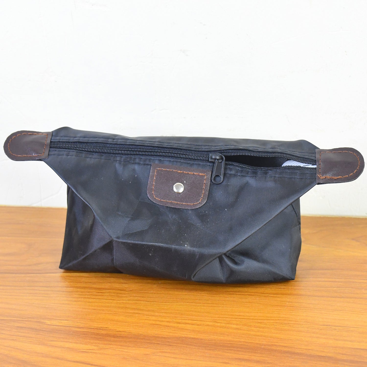 Foldable waterproof travel toiletry bag with secure zipper closure