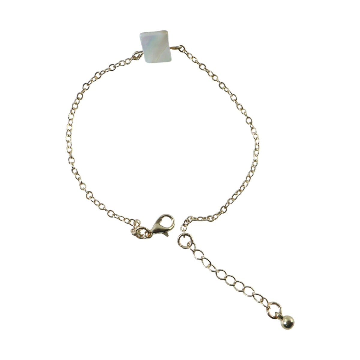 Detailed view of square stone charm on adjustable chain bracelet