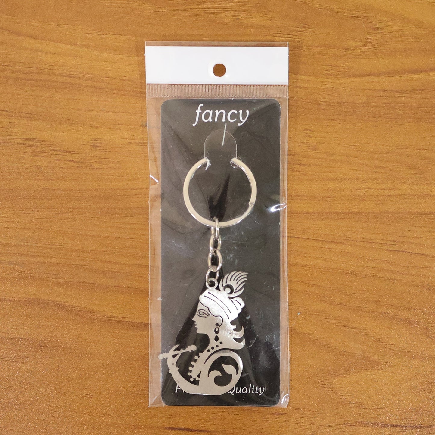 Lord Krishna face keychain in premium metal finish