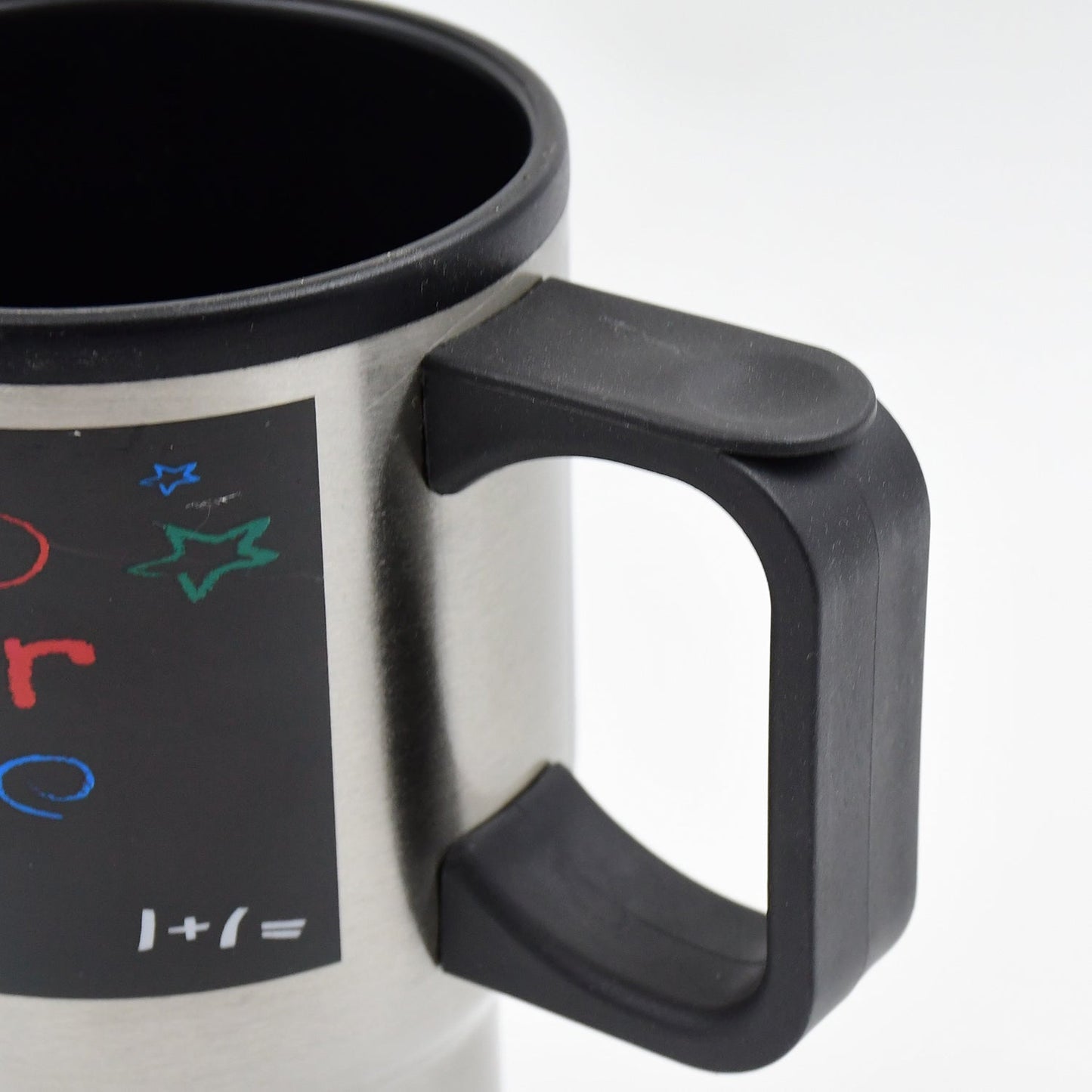 Fervent stainless steel tumbler placed in a car cup holder, perfect for travel.