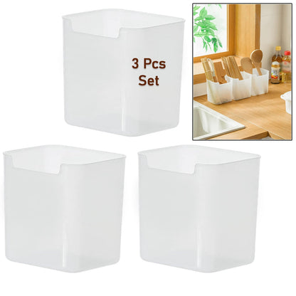 Clear plastic drawer organizers holding various makeup items on a vanity.