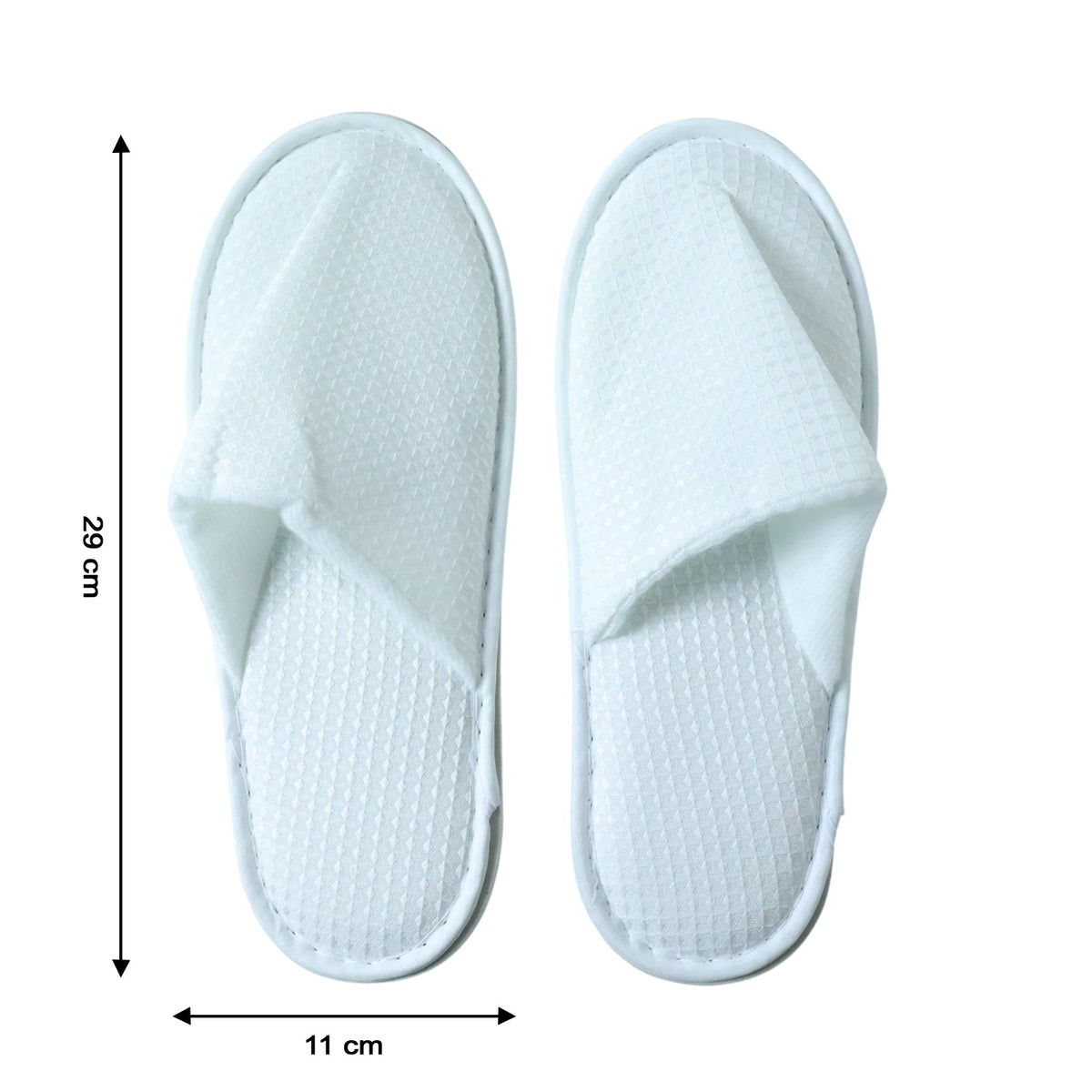 Disposable hotel guest slippers neatly packaged for convenience