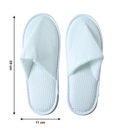 Disposable hotel guest slippers neatly packaged for convenience