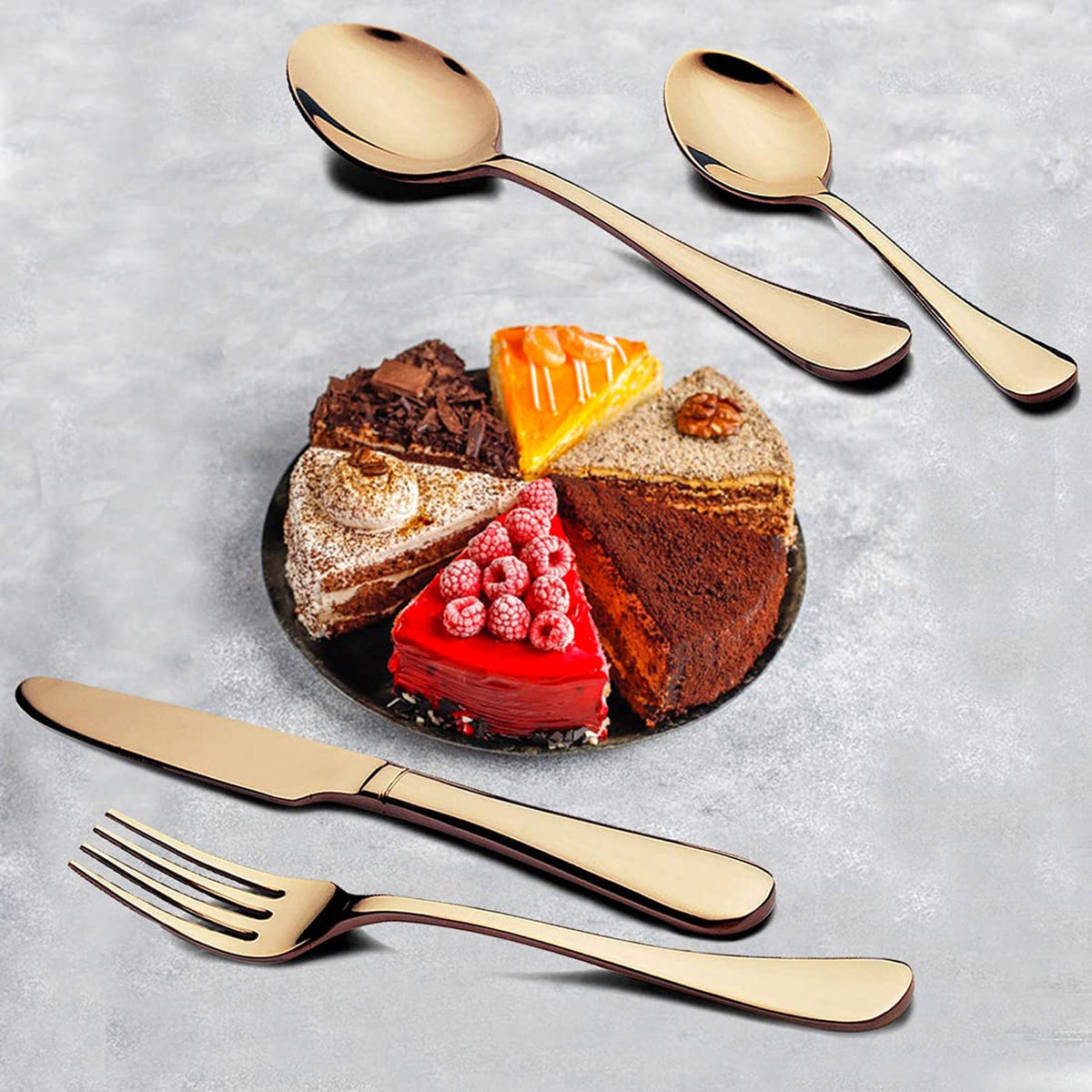Full 24-piece gold flatware set with forks, spoons, and knives in its gift box.