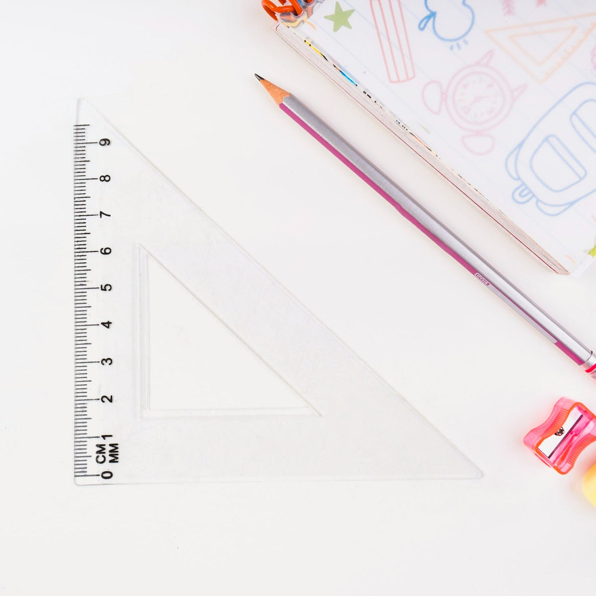 Transparent plastic protractor and straight ruler for geometry measurements