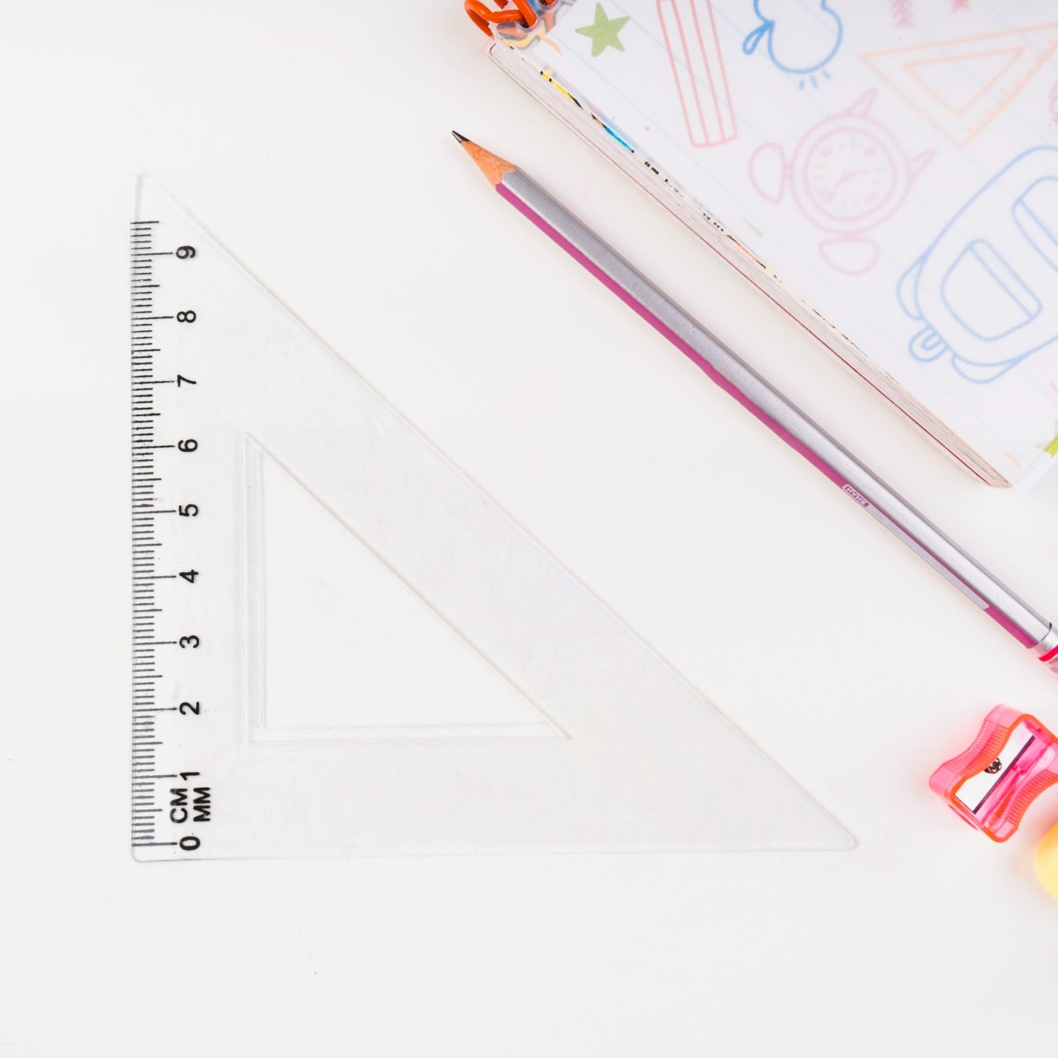 Transparent plastic protractor and straight ruler for geometry measurements