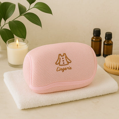 Lingerie wash bag protecting a bra and panties during machine wash.