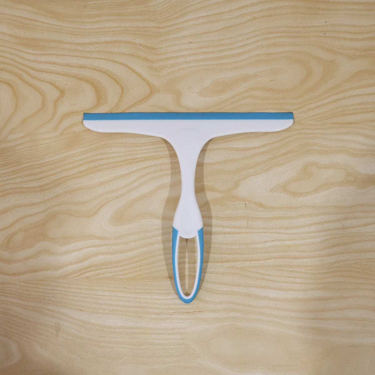 Live photo of plastic kitchen and shower squeegee wiper