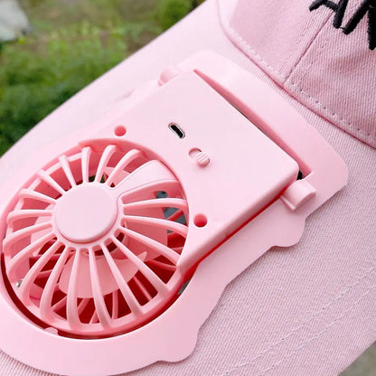Detailed view of the 3-speed mini fan on the brim, highlighting its protective cover.