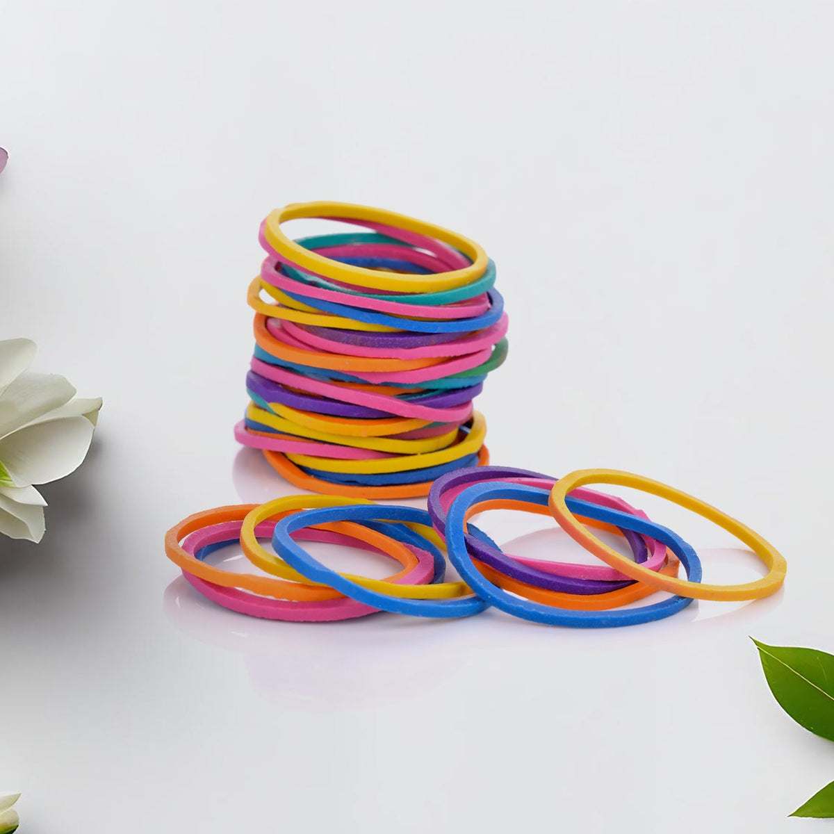 Durable nylon rubber bands keeping various electronic cables tidy and organized.