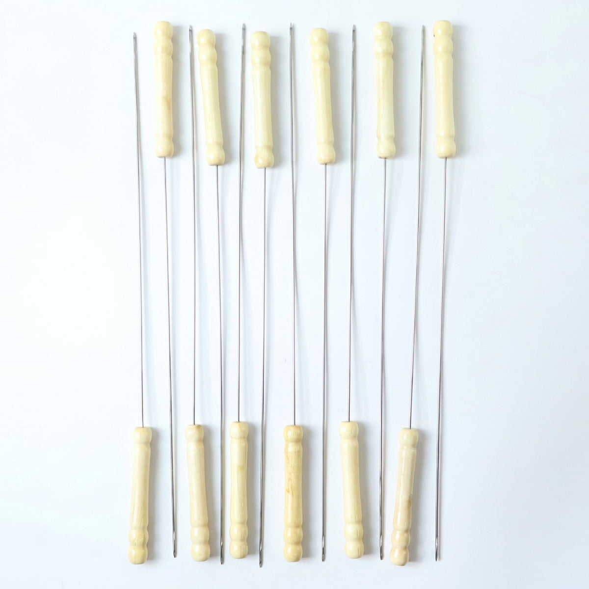 Grilling skewers set with wooden handles for kebabs and vegetables
