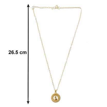 angled view of golden necklace chain and intricate pendant
