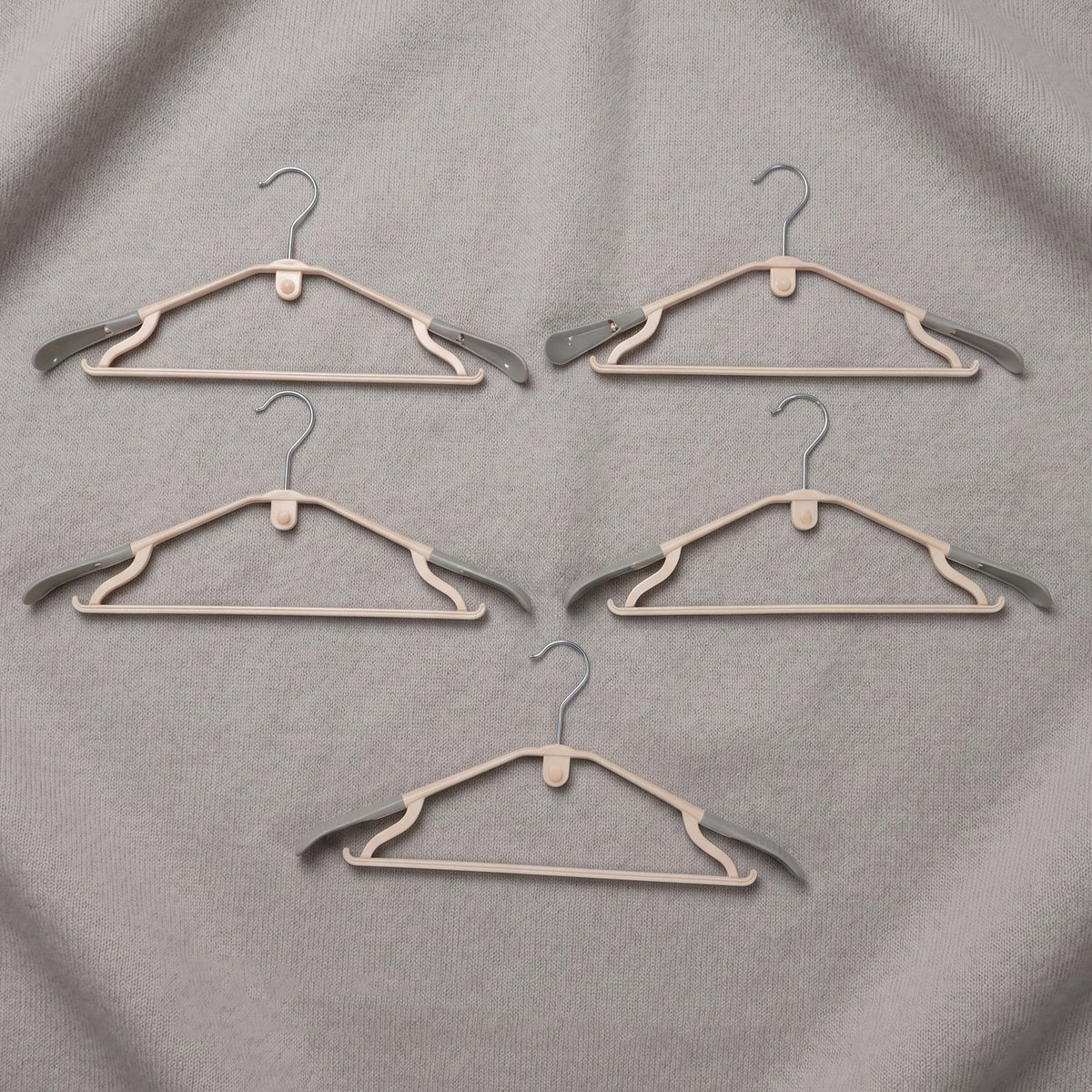 Sturdy plastic clothes hangers for daily wardrobe use