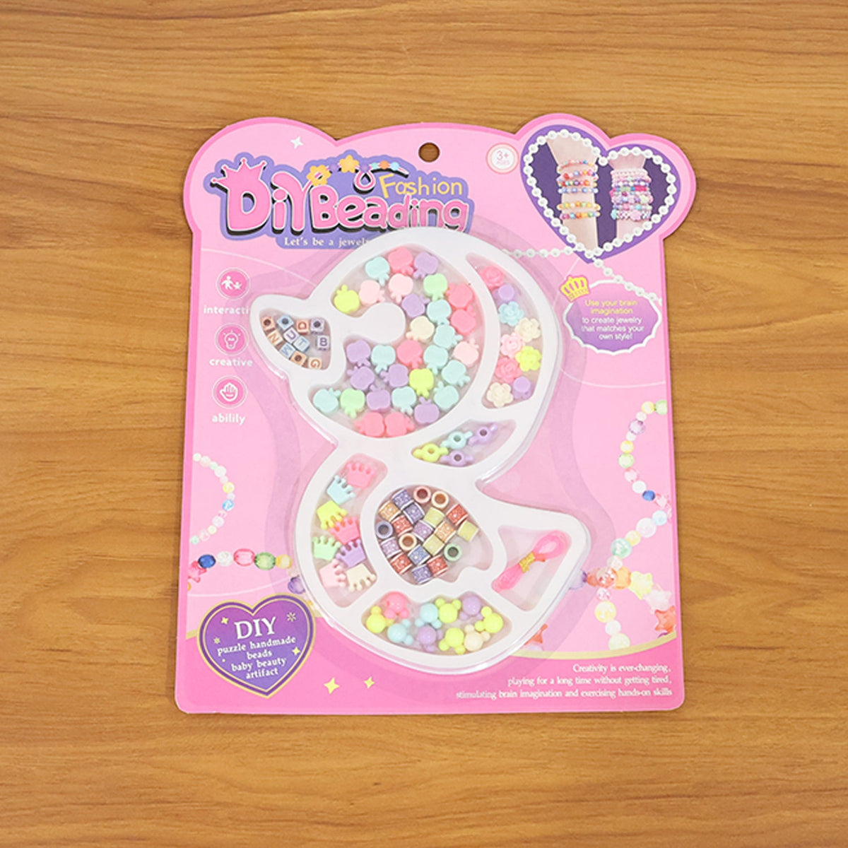 DIY kids jewelry craft kit with alphabet, flower, and crown beads