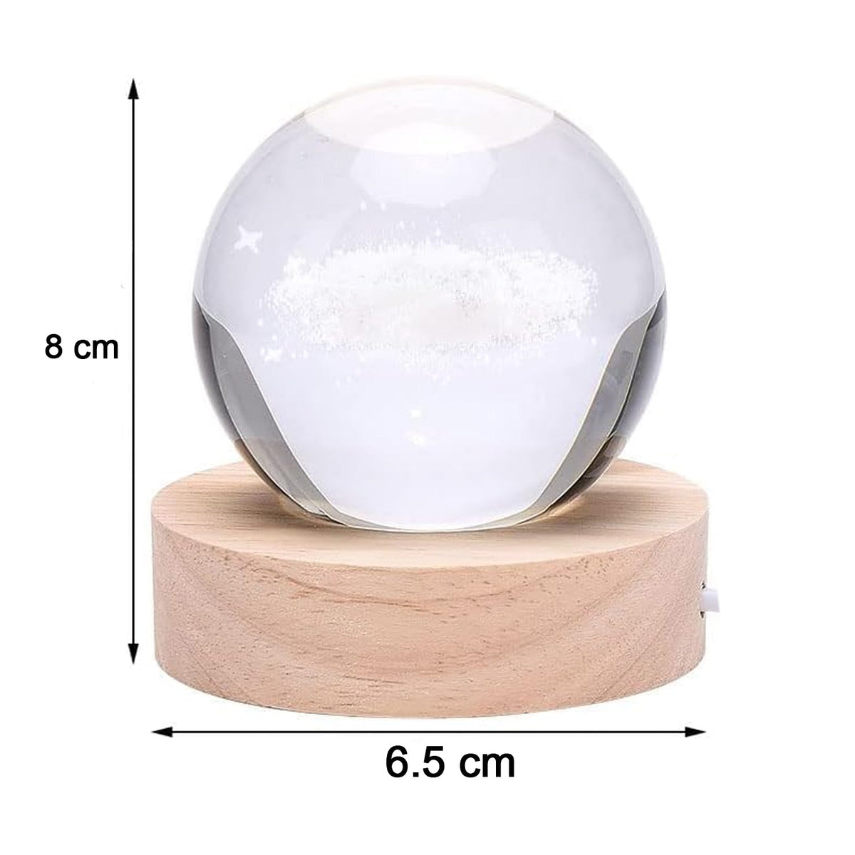 Hand holding the crystal ball lamp to show its compact size and portability.