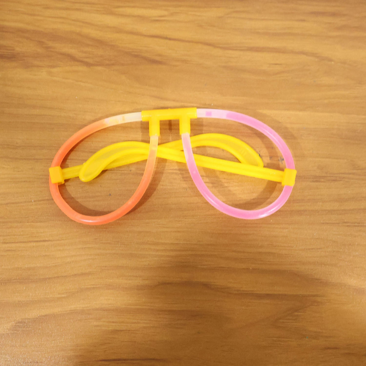 Live event with partygoers wearing glowing neon glasses