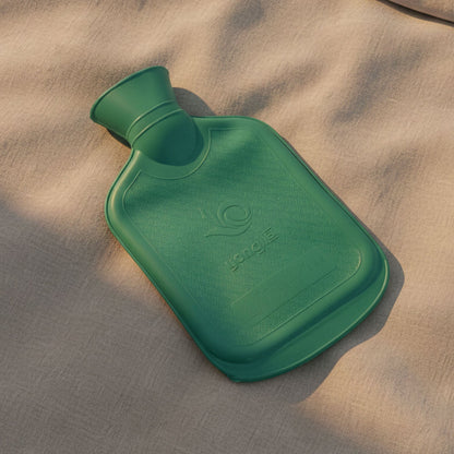 Hot water bottle providing warmth for muscle and joint pain relief