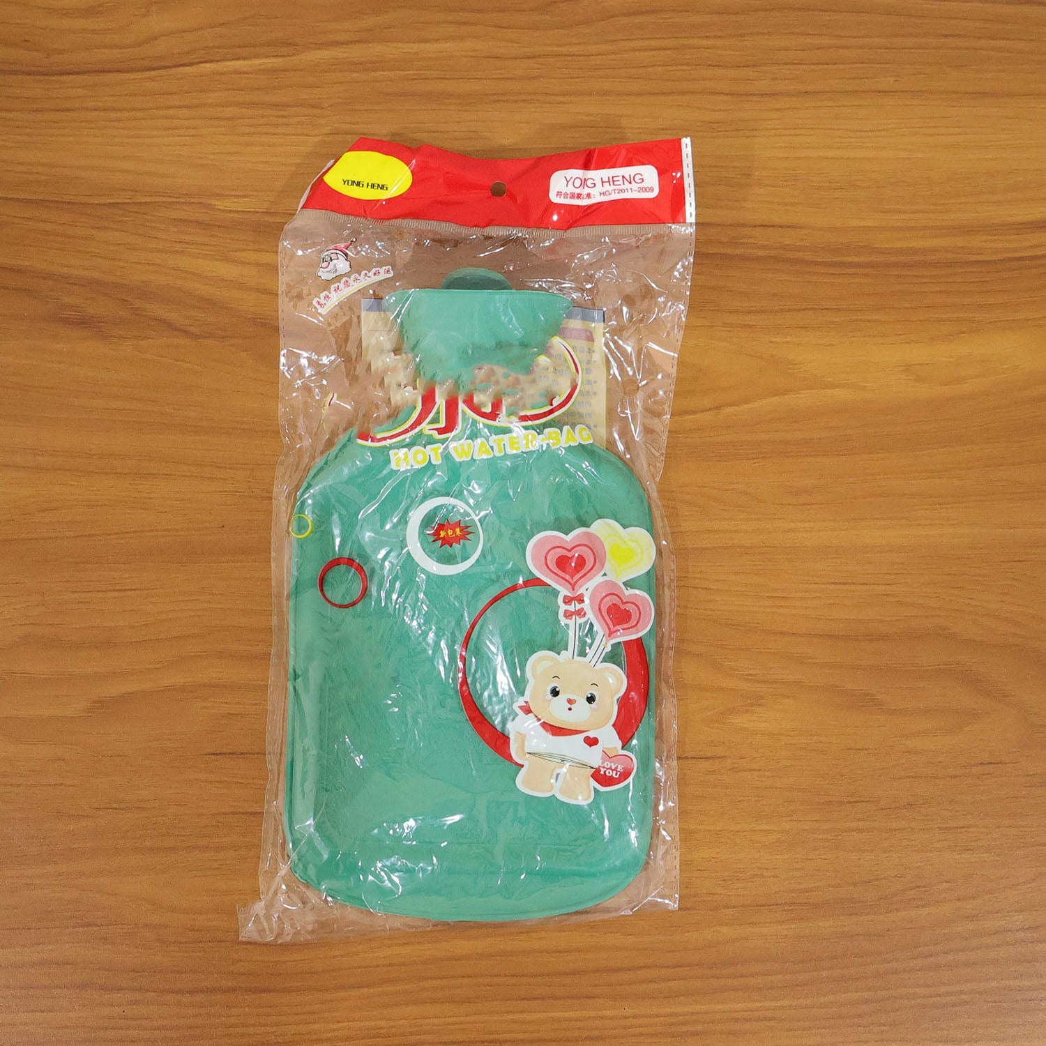 Hot water bottle in use at home for soothing warmth and pain relief
