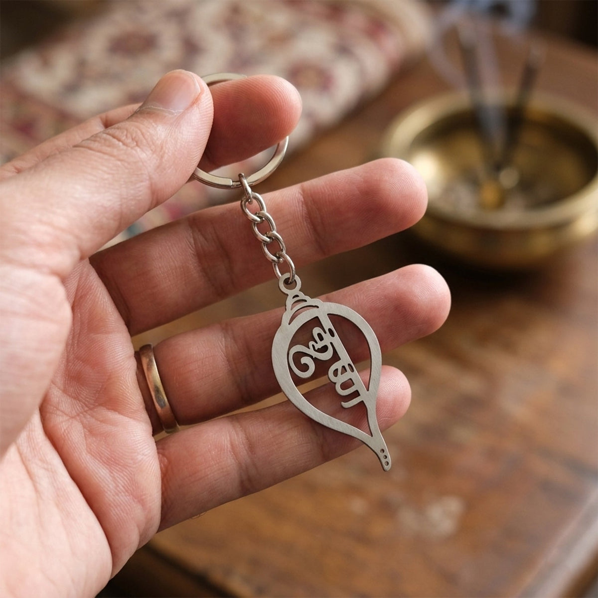 Spiritual Krishna shankh engraved keychain