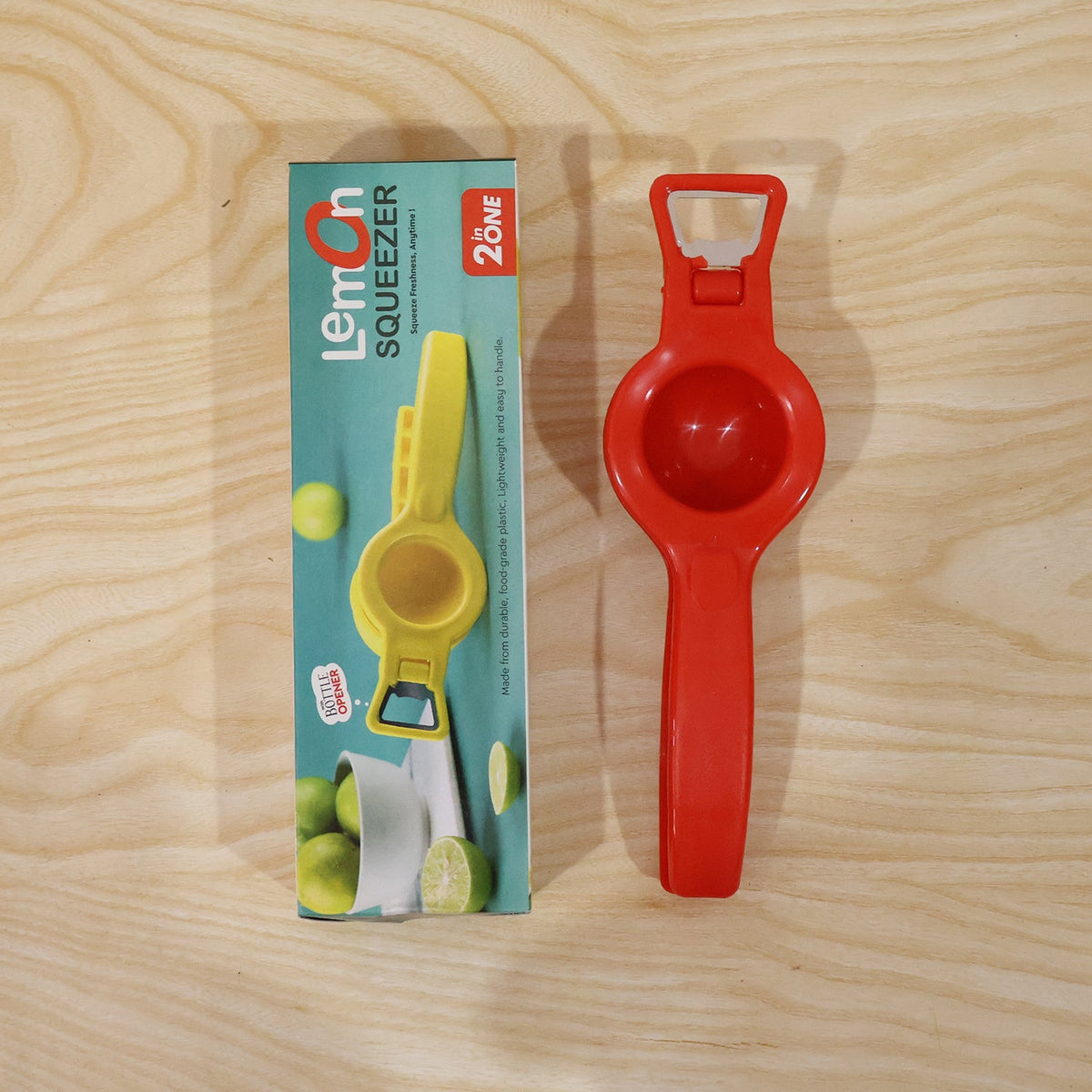 Person actively using the 2-in-1 lemon squeezer to juice a lemon.