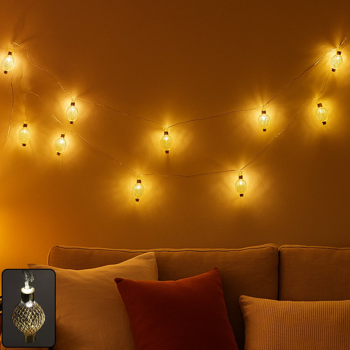 Flexible warm LED string light with decorative hollow metal balls