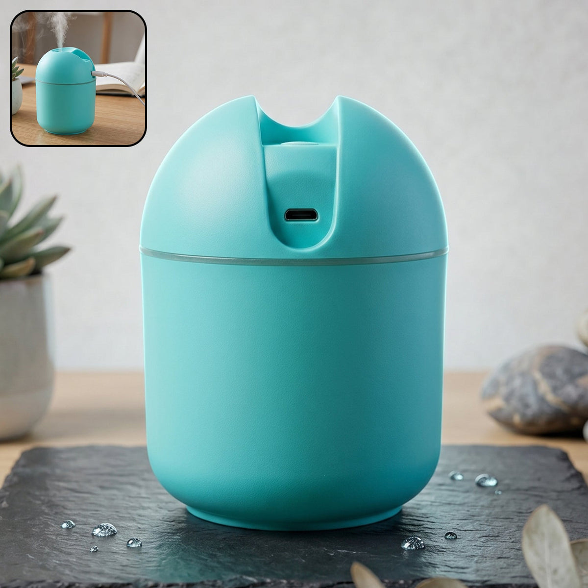 Portable USB mini air humidifier releasing cool mist for home or travel