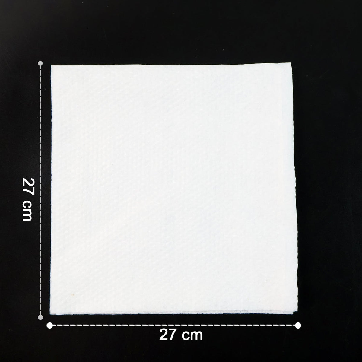 Multicolor tissue paper elegantly folded and used as a disposable table napkin.