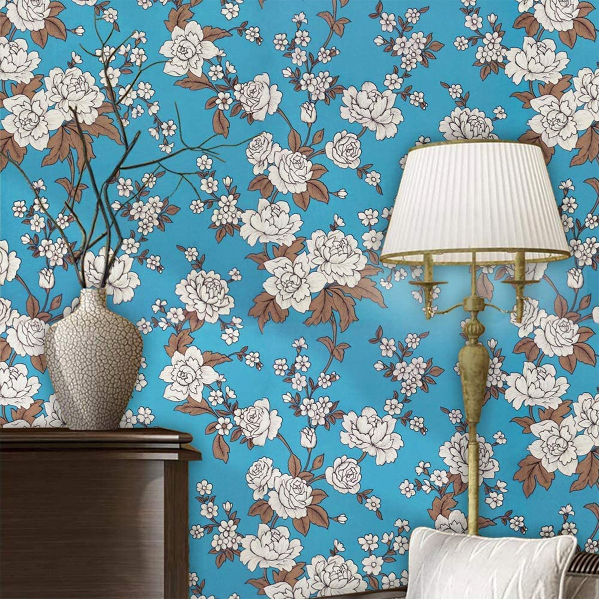 Applied floral wallpaper roll on wall showcasing vibrant pattern