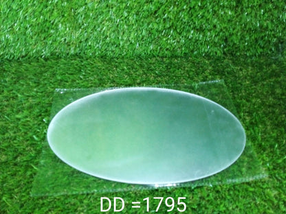 An oval mirror sticker shown in a home office setting, adding a reflective accent.