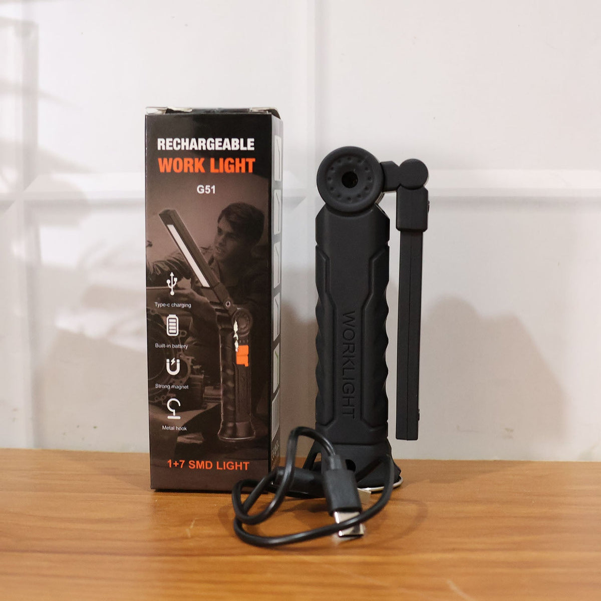 Close-up of rechargeable LED work light in use for home repair tasks